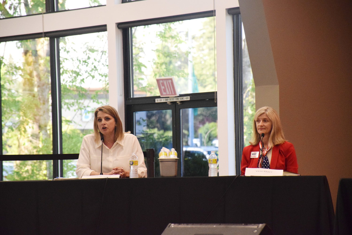 Washington state Third Congressional District candidate Heidi St. John, left, and Vicki Kraft  take part in a forum at RV Inn Style Resorts event hall in Hazel Dell May 31.